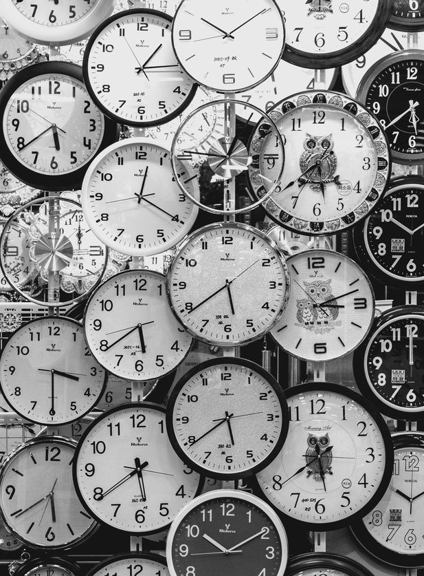 Black And White Photo Of Clocks